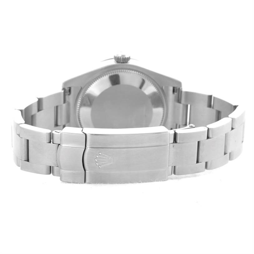 The image shows the back and clasp of a Mid-Size Rolex watch, focusing on the bracelet and case back.