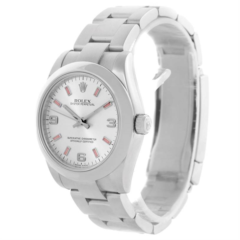 The image shows a Rolex Oyster Perpetual Mid-Size watch at a slight angle, including the dial, bezel, crown, and bracelet.