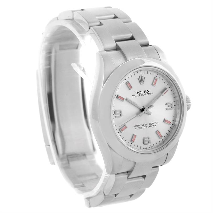 The image shows a side angle of a Mid-Size Rolex Oyster Perpetual watch, highlighting the bracelet, case, and dial.