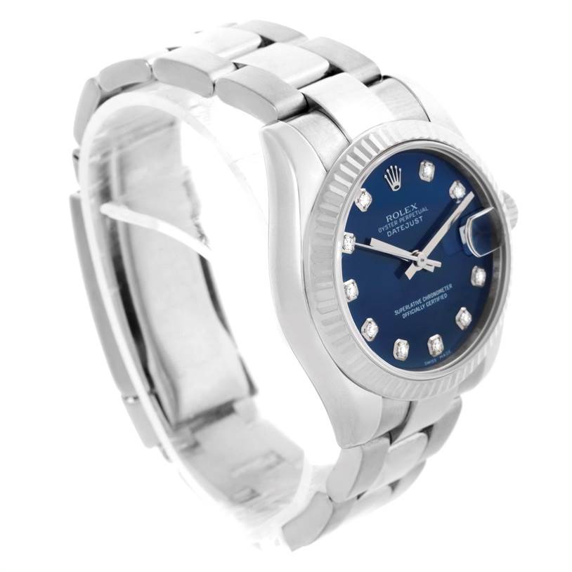 The Rolex Mid-Size 178274 Women's Stainless Steel Blue Dial 178274 Women's Stainless Steel Blue Dial Datejust watch is shown at a three-quarter angle, highlighting its bracelet, case, bezel, and dial with hour markers.