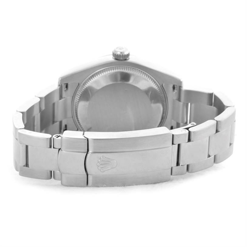 This is a rear view of the Rolex Mid-Size 178274 Women's Stainless Steel Blue Dial 178274 Women's Stainless Steel Blue Dial model, showing the case back and the bracelet with the clasp.