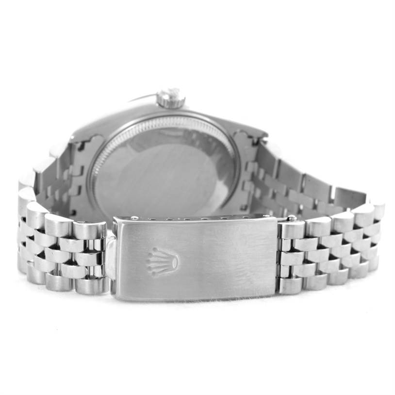 This image shows the backside and clasp of a Rolex Mid-Size 78240 Women's Stainless Steel Pink Dial 78240 Women's Stainless Steel Pink Dial watch, with a focus on the bracelet and case back.