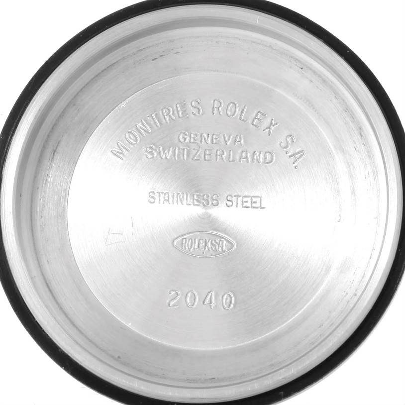 This image shows the stainless steel case back of a Rolex Mid-Size 78240 Women's Stainless Steel Pink Dial 78240 Women's Stainless Steel Pink Dial watch, displaying brand engravings and model number 2040.