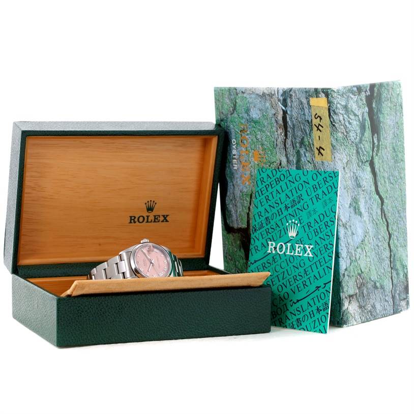This image shows a Rolex Mid-Size 78240 Women's Stainless Steel Pink Dial 78240 Women's Stainless Steel Pink Dial watch in an open wooden box with an outer green box and accompanying booklets.