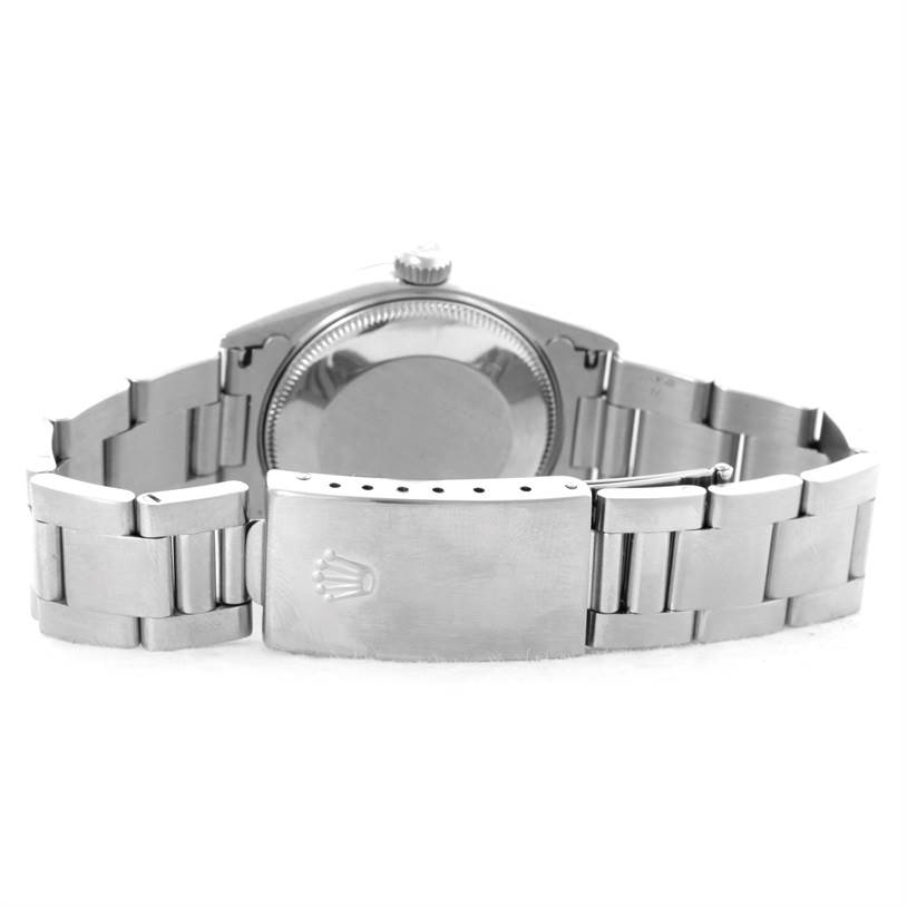 This image shows the back view of a Rolex Mid-Size 78240 Women's Stainless Steel Pink Dial 78240 Women's Stainless Steel Pink Dial watch, featuring its clasp and bracelet.