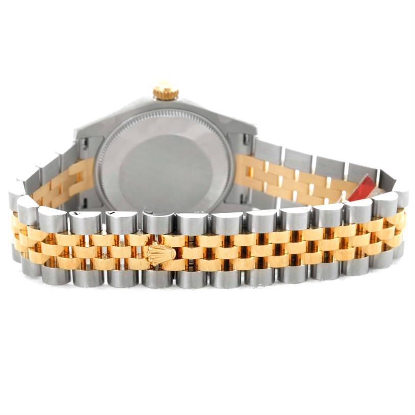 The image shows the back and bracelet of a Rolex Mid-Size 178273 Women's Steel and Gold (two tone) Green Dial 178273 Women's Steel and Gold (two tone) Green Dial watch, highlighting its two-tone metal design and logo.