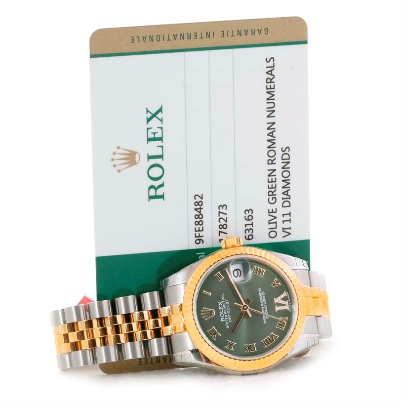 The image shows a Mid-Size Rolex watch with an olive green Roman numeral dial and a two-tone bracelet, alongside its authenticity card.