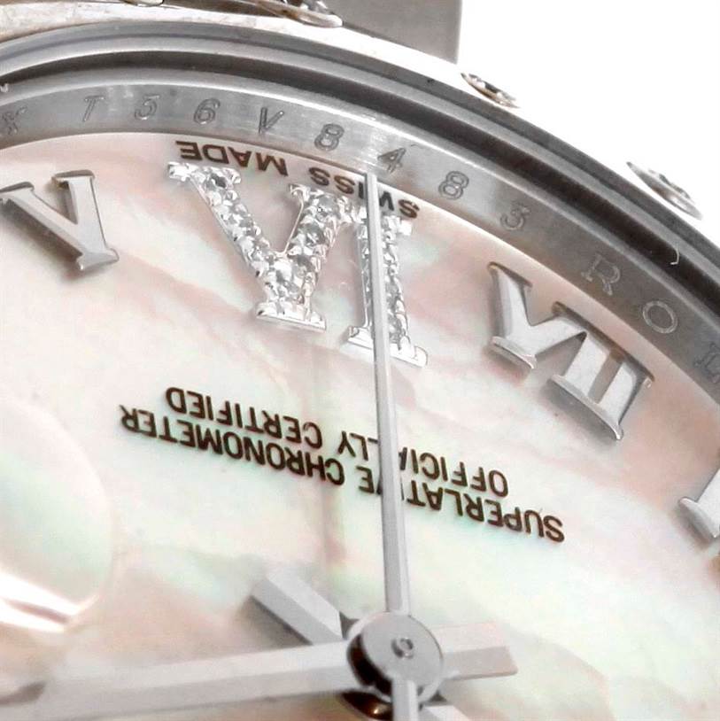 The close-up image shows the face of a Mid-Size Rolex watch, focusing on the Roman numerals and “Superlative Chronometer” text.