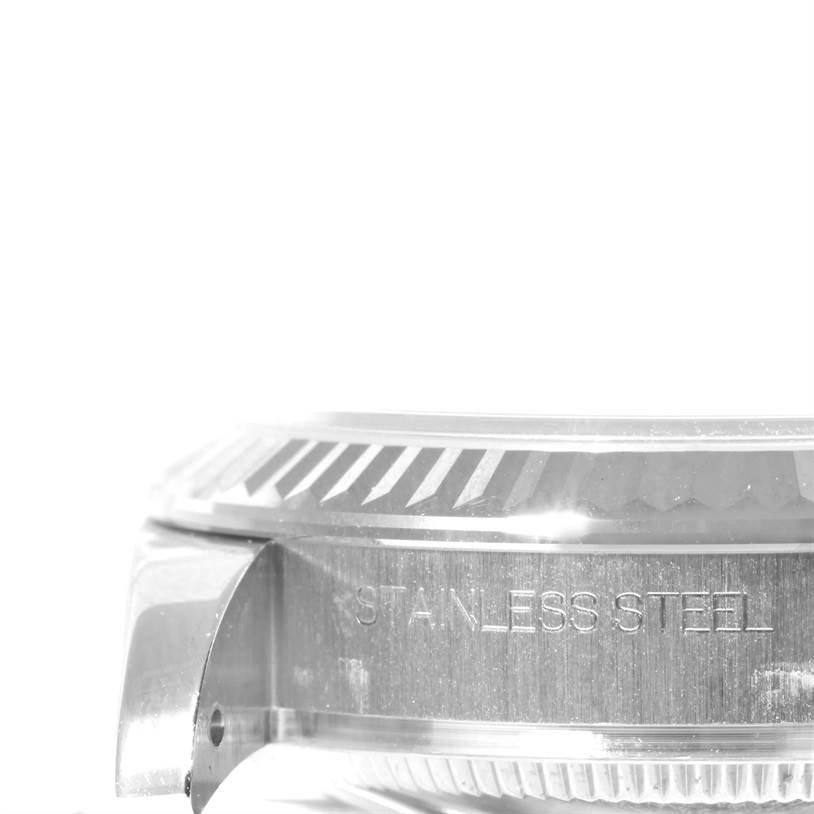 The image shows a close-up side view of the stainless steel case and bezel of a Rolex Mid-Size 178274 Women's Stainless Steel Pink Dial 178274 Women's Stainless Steel Pink Dial model.