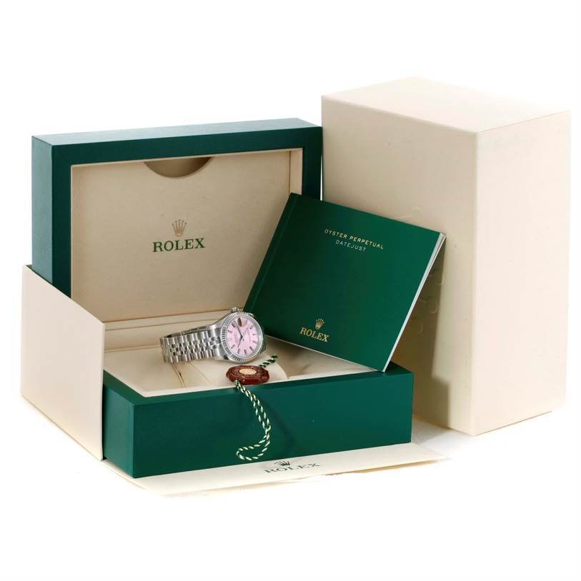 The image shows a Rolex Mid-Size 178274 Women's Stainless Steel Pink Dial 178274 Women's Stainless Steel Pink Dial watch with a pink dial, in its box along with the guarantee booklet and tags.