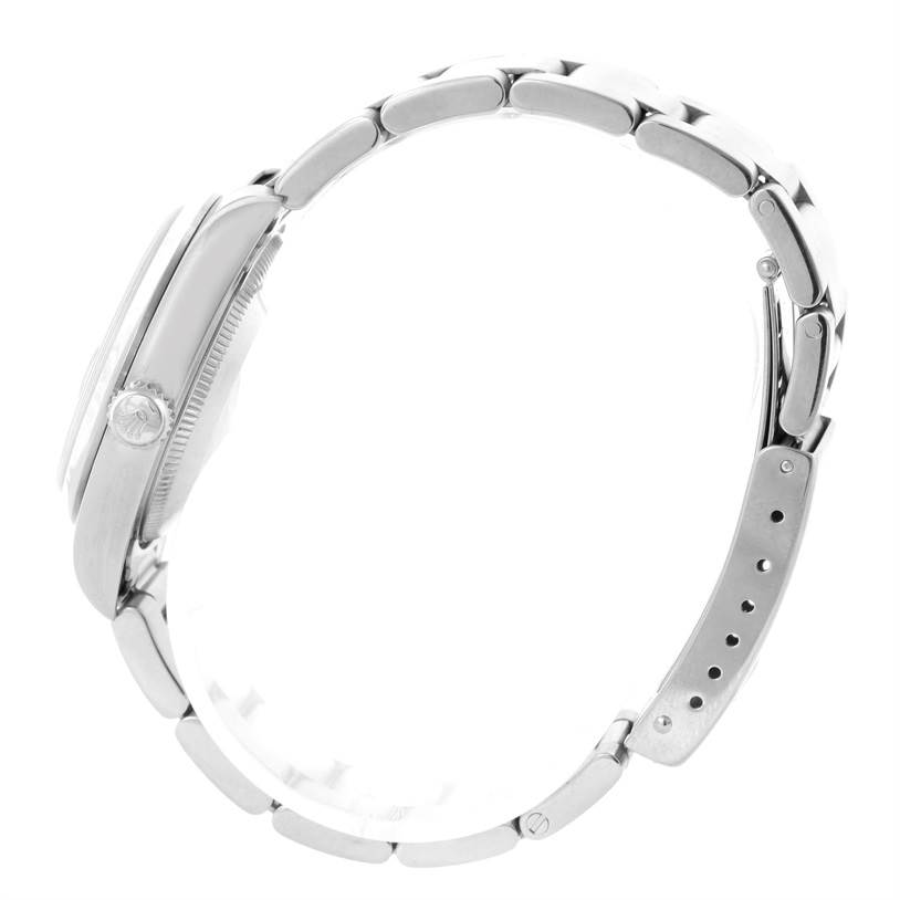 This image shows the side profile of a mid-size Rolex watch, highlighting the case, crown, and bracelet.