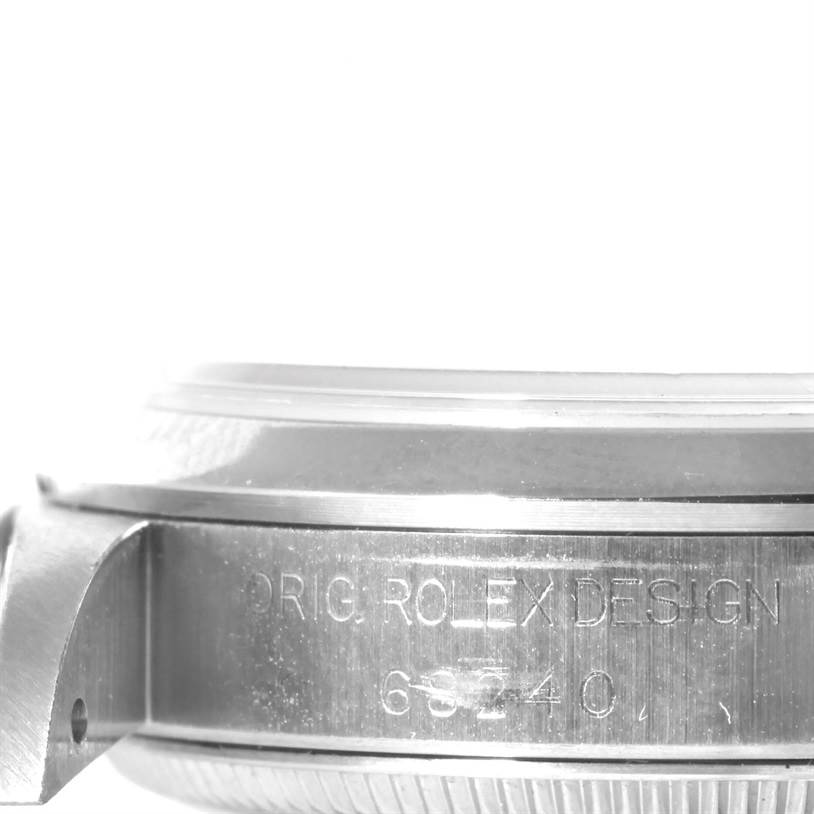This image shows a side view of a Rolex Mid-Size 68240 Women's Stainless Steel White Dial 68240 Women's Stainless Steel White Dial watch case with the model number "68240" engraved on it.