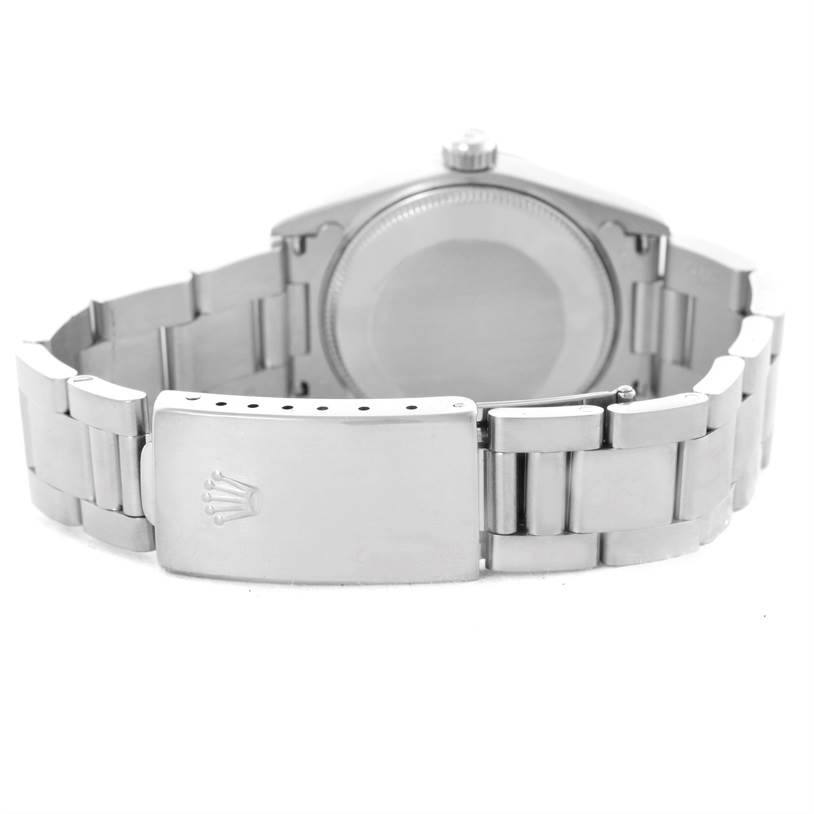 This image shows the backside and clasp of a Rolex Mid-Size 68240 Women's Stainless Steel White Dial 68240 Women's Stainless Steel White Dial model watch at a rear angle.