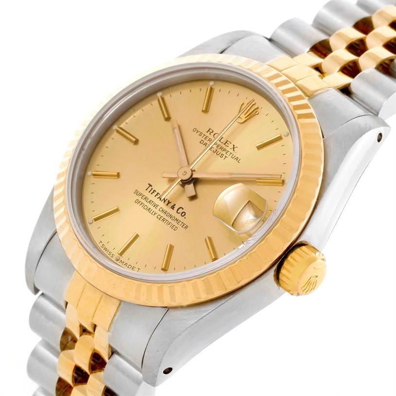 This Rolex Mid-Size 68273 Women's Steel and Gold (two tone) Champagne Dial 68273 Women's Steel and Gold (two tone) Champagne Dial model watch is shown from an angled side view, highlighting the two-tone bezel, dial, and bracelet.