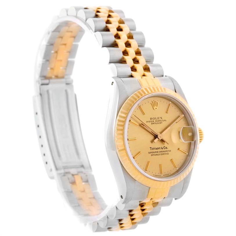 The image shows a side-angle view of a Rolex Mid-Size 68273 Women's Steel and Gold (two tone) Champagne Dial 68273 Women's Steel and Gold (two tone) Champagne Dial Oyster Perpetual Datejust, highlighting its face and jubilee bracelet.