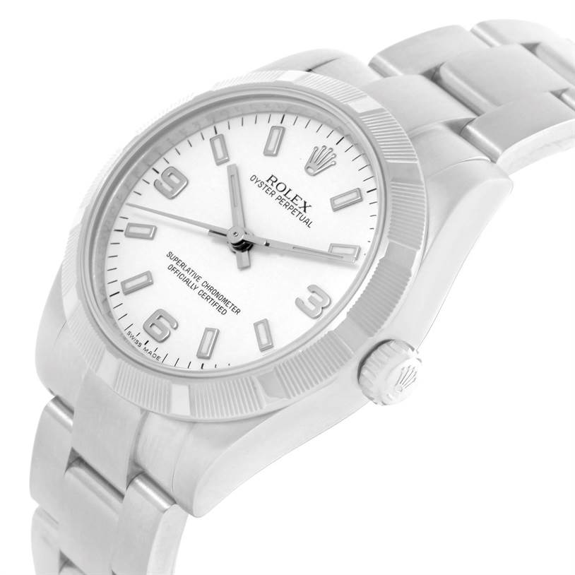 This image shows the dial, bezel, crown, and part of the bracelet of a Rolex Mid-Size 177210 Women's Stainless Steel White Dial 177210 Women's Stainless Steel White Dial Oyster Perpetual watch at an angled view.