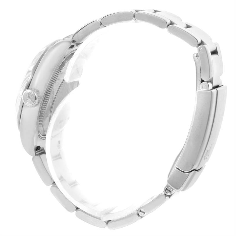 This image shows the side view of a Mid-Size Rolex watch, highlighting the crown and bracelet.