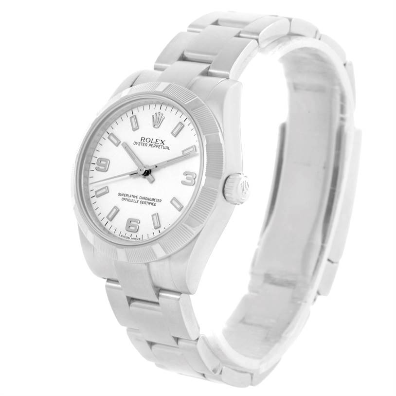 The Rolex Mid-Size 177210 Women's Stainless Steel White Dial 177210 Women's Stainless Steel White Dial Oyster Perpetual watch is shown from an angled view, highlighting its face, crown, and bracelet.