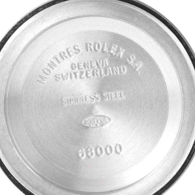 This image shows the inner case back of a Rolex Mid-Size 68240 Women
s Stainless Steel Blue Dial 68240 Women
s Stainless Steel Blue Dial model, displaying branding and model number 68000.