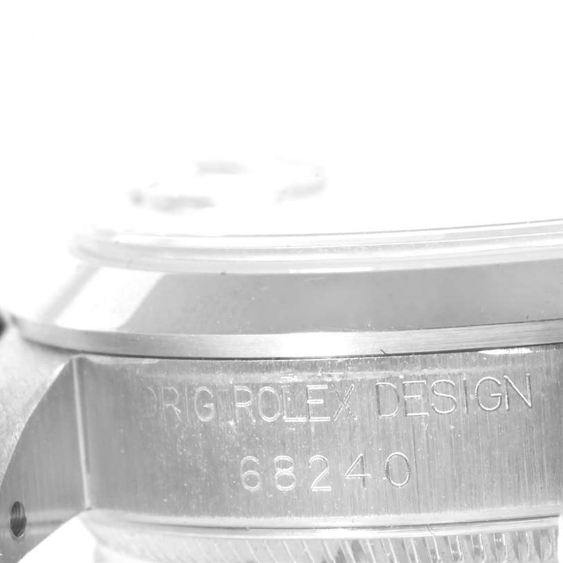 The image shows a close-up side view focusing on the engraved model number 68240 of a Mid-Size Rolex watch.
