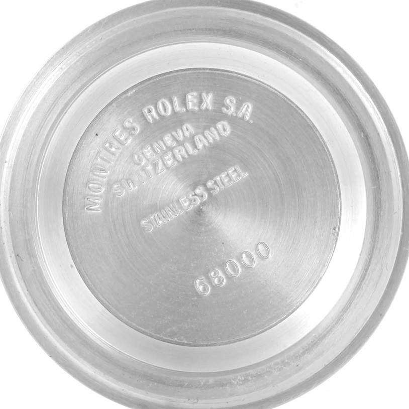 This image shows the back case of a Mid-Size model Rolex watch, specifically the inner side with engraved text.