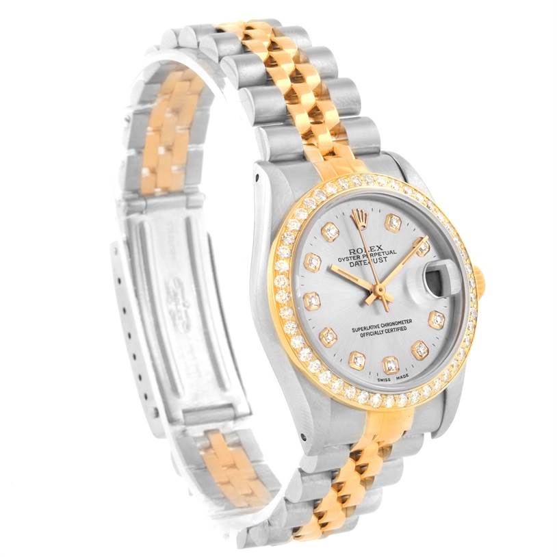 The image shows a front angle of a Rolex Mid-Size 68273 Women's Steel and Gold (two tone) Silver Dial 68273 Women's Steel and Gold (two tone) Silver Dial Datejust with a two-tone bracelet and a diamond-set bezel.