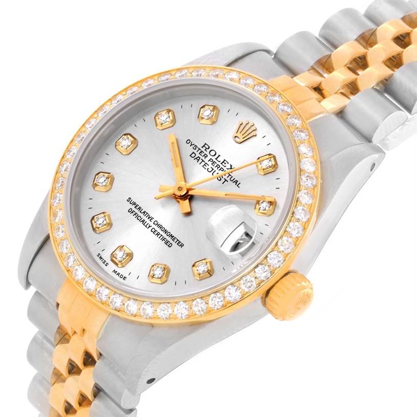 The image shows a Rolex Mid-Size 68273 Women's Steel and Gold (two tone) Silver Dial 68273 Women's Steel and Gold (two tone) Silver Dial watch from an angled top-down view, highlighting its diamond-studded bezel, dial, and two-tone bracelet.