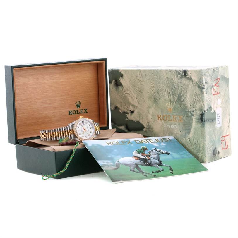 This image shows a Rolex Mid-Size 68273 Women's Steel and Gold (two tone) Silver Dial 68273 Women's Steel and Gold (two tone) Silver Dial watch set at an angle, with the watch, original box, and manual included.