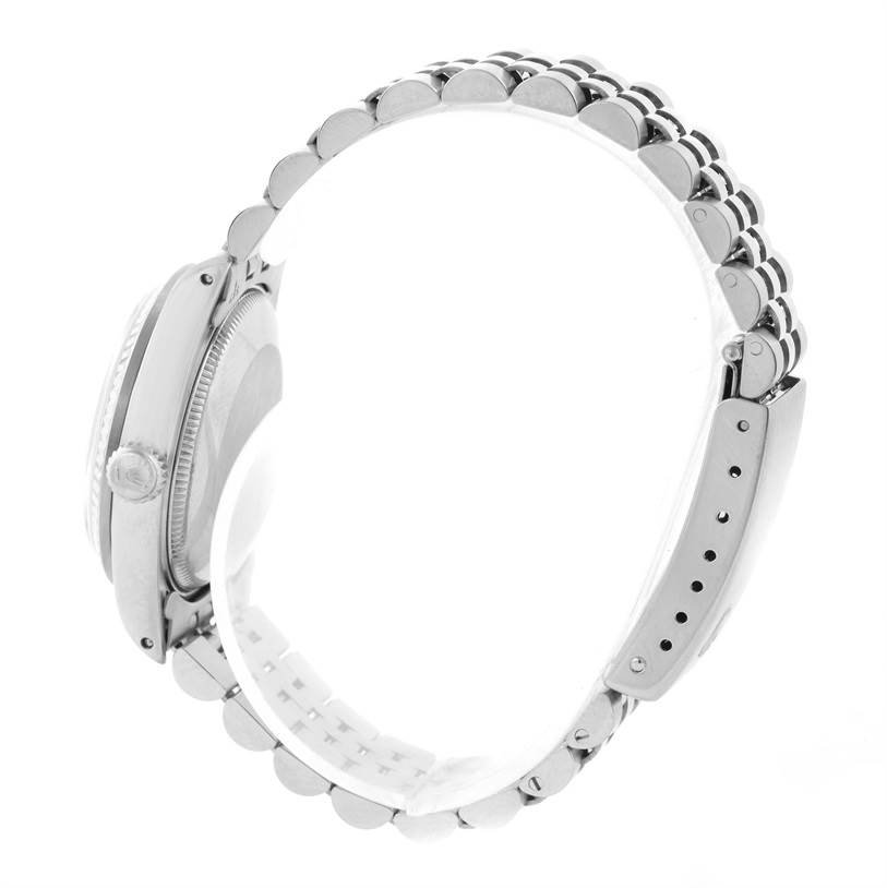 The image shows a side profile of a Rolex Mid-Size 68274 Women's Stainless Steel White Dial 68274 Women's Stainless Steel White Dial model, highlighting the bracelet and case.