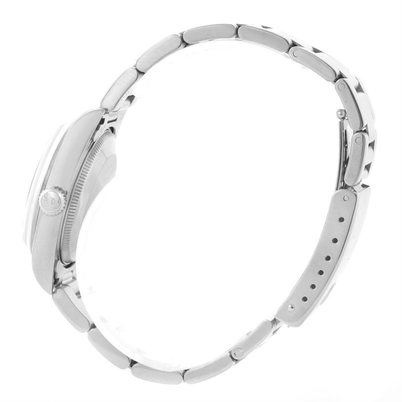 The image shows a side profile of a Rolex Mid-Size 78240 Women's Stainless Steel Pink Dial 78240 Women's Stainless Steel Pink Dial model watch, highlighting the bracelet, crown, and case.