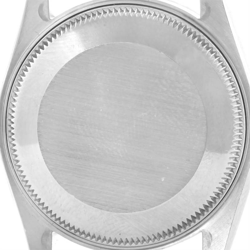 The image shows the back casing of a Mid-Size Rolex watch, viewed from the backside angle.