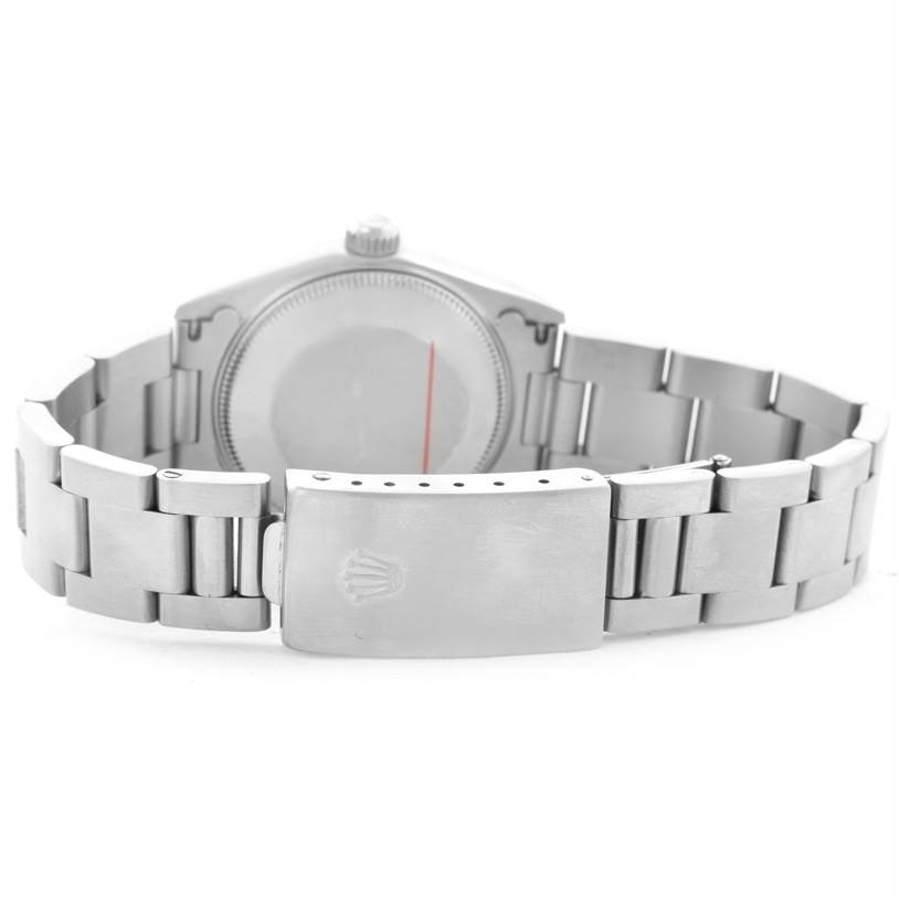 This image shows the back and clasp of a Rolex Mid-Size 78240 Women's Stainless Steel Blue Dial 78240 Women's Stainless Steel Blue Dial model watch.