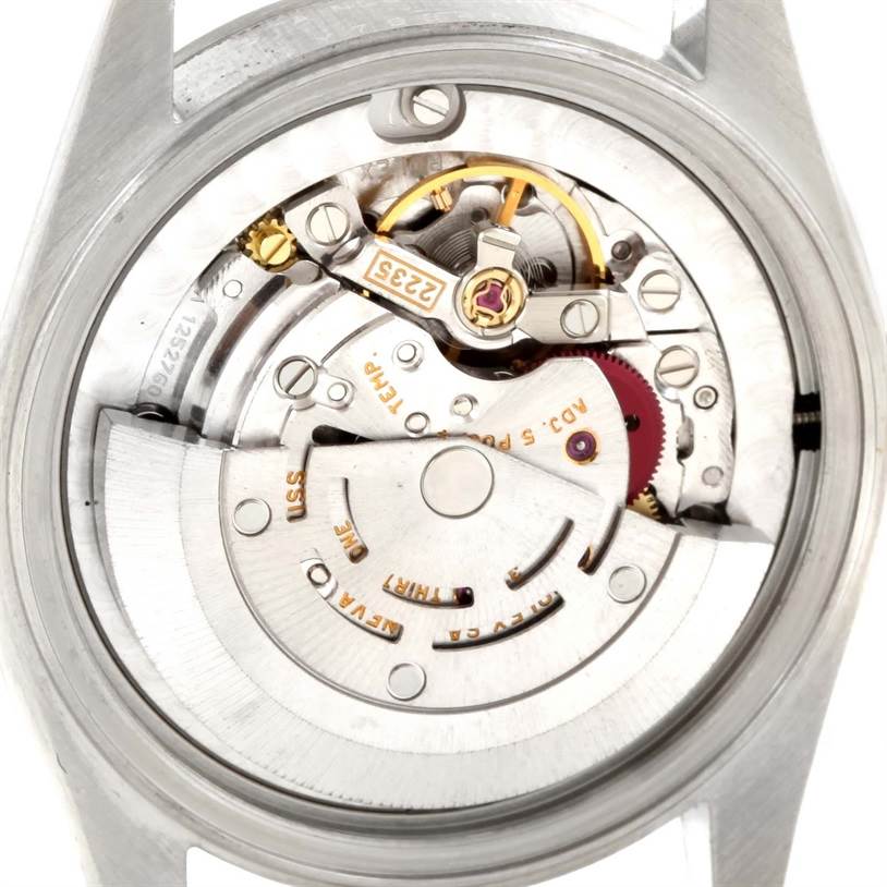 This image shows the internal mechanism of a Mid-Size Rolex watch from the rear angle.