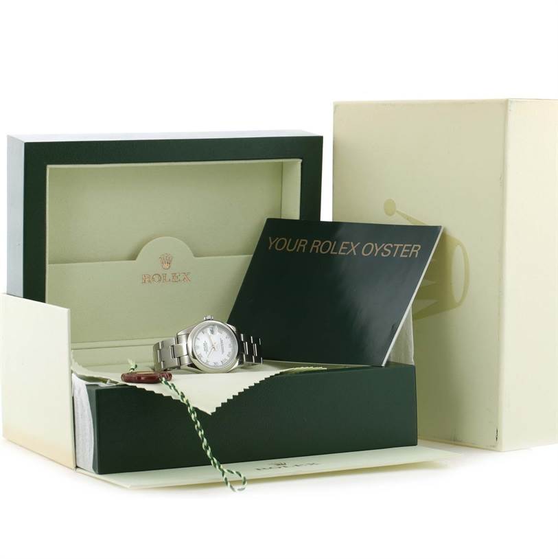 The Rolex Mid-Size 178240 Women's Stainless Steel White Dial 178240 Women's Stainless Steel White Dial watch is shown in its open box with an instruction booklet and a tag visible.