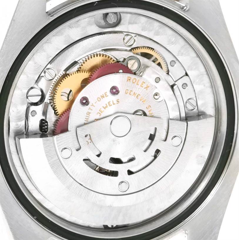 The image shows the internal mechanical movement of a Rolex Mid-Size 178273 Women's Steel and Gold (two tone) Silver Dial 178273 Women's Steel and Gold (two tone) Silver Dial watch from a top-down angle.