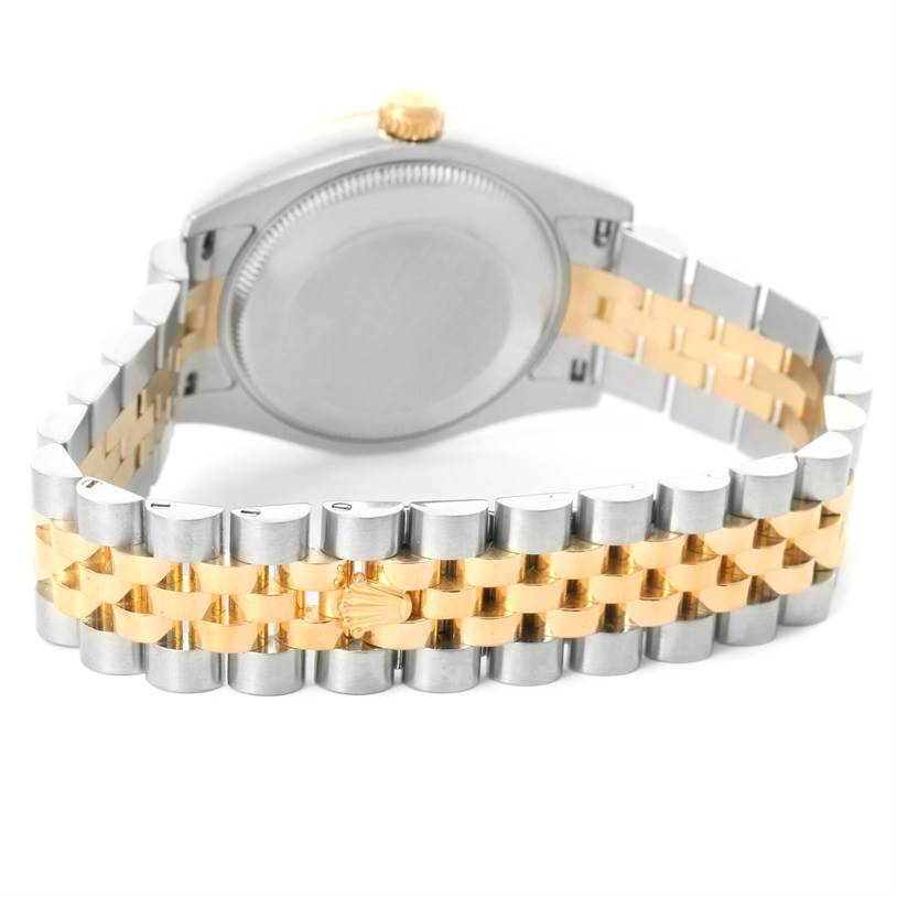 The image shows the case back and Jubilee bracelet of a Mid-Size Rolex watch from a rear angle.