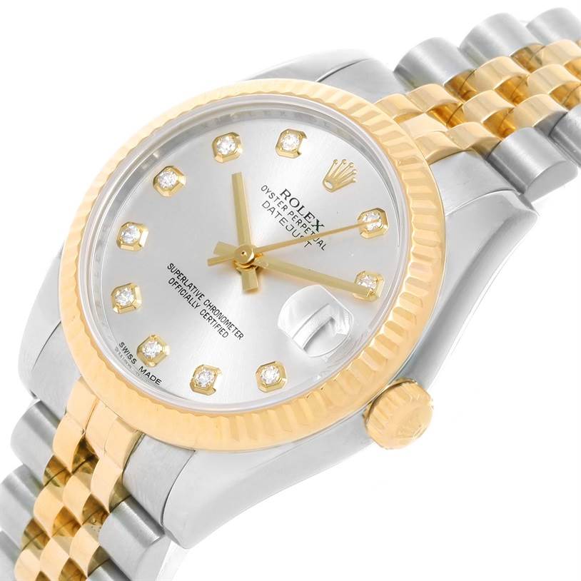 This Rolex Mid-Size 178273 Women's Steel and Gold (two tone) Silver Dial 178273 Women's Steel and Gold (two tone) Silver Dial model is shown from an angled view, highlighting its face, bezel, crown, and part of the bracelet.