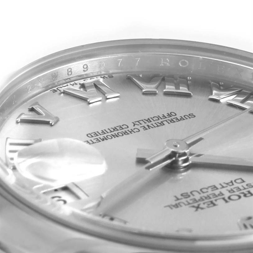 This close-up image of a Rolex Mid-Size 178240SRJ Women's Stainless Steel Grey Dial 178240SRJ Women's Stainless Steel Grey Dial watch displays the dial, hands, and Roman numeral markers.