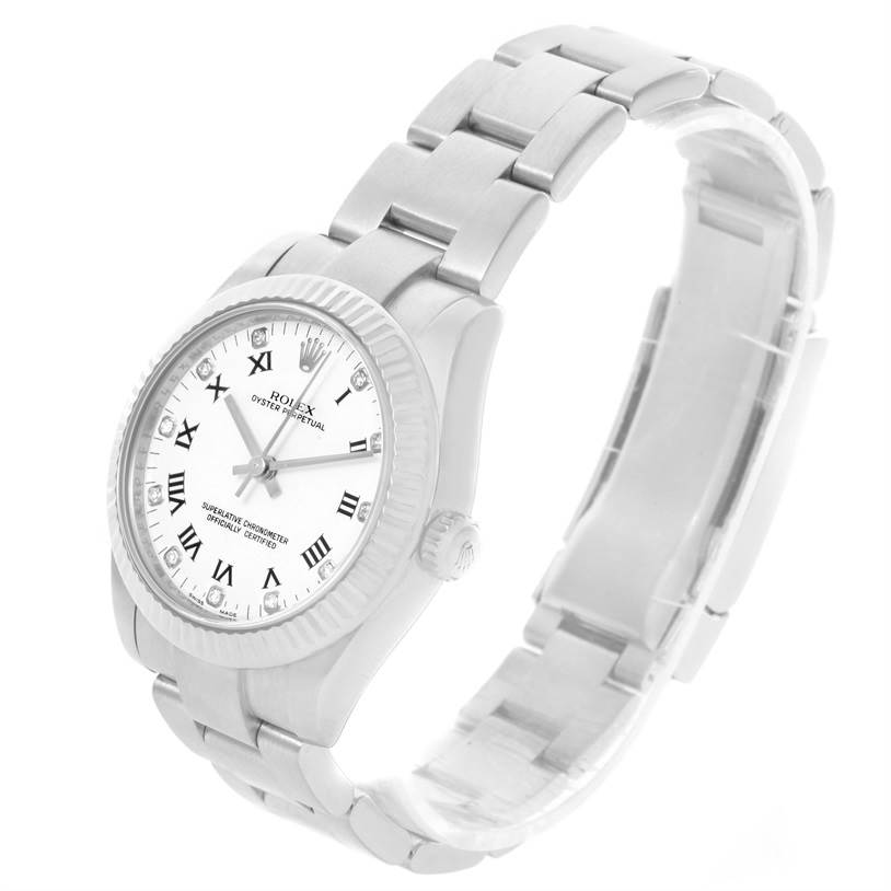 The image shows a mid-size Rolex Oyster Perpetual watch with a white dial and stainless steel bracelet, viewed from a 3/4 front angle.