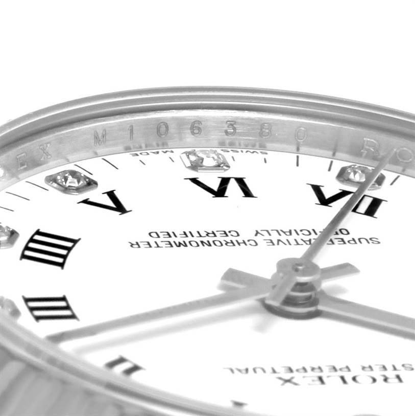 This close-up image shows the face, Roman numerals, and partial serial number of a Rolex Mid-Size 177234WRDO Women's Stainless Steel White Dial 177234WRDO Women's Stainless Steel White Dial watch.