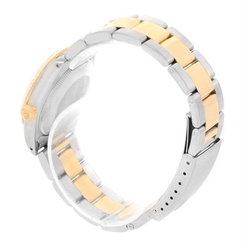 This image shows a side angle of a Rolex Mid-Size 68273 Women's Steel and Gold (two tone) Champagne Dial 68273 Women's Steel and Gold (two tone) Champagne Dial watch, highlighting the bracelet and clasp components.