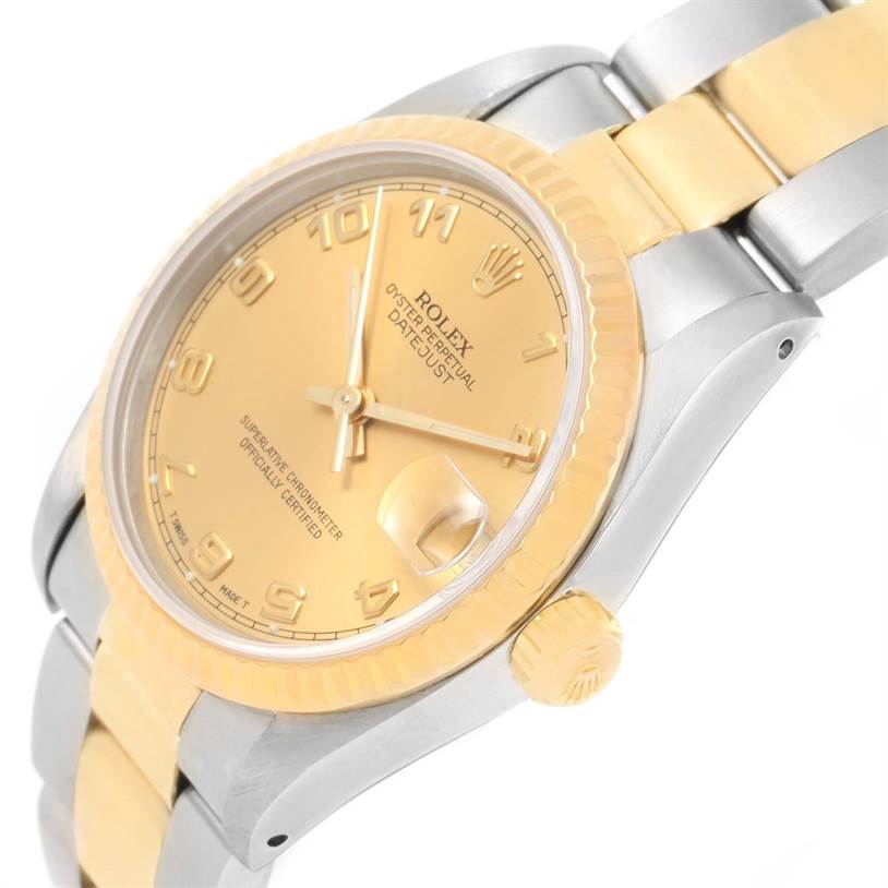 The image shows a close-up angle of a Mid-Size Rolex Datejust watch, showcasing the dial, crown, bezel, and part of the bracelet.