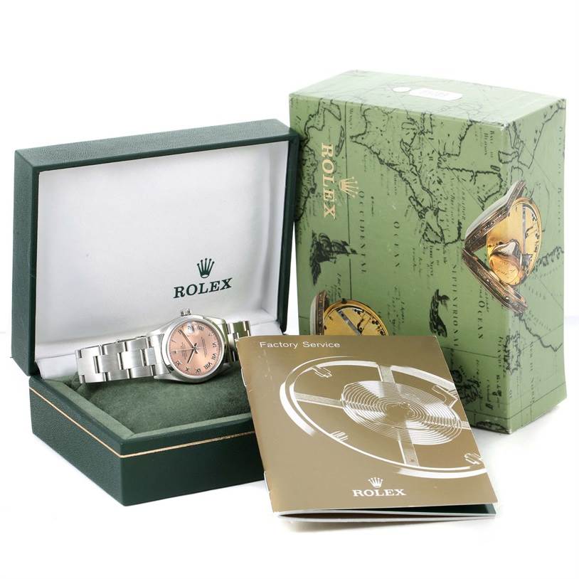 The image shows a Rolex Mid-Size 68240 Women's Stainless Steel Blue Dial 68240 Women's Stainless Steel Blue Dial model watch inside its box along with the outer green box and a factory service booklet angled towards the viewer.