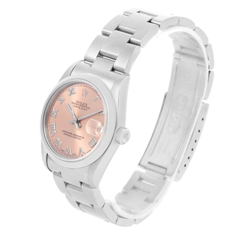 This image shows a Rolex Mid-Size 68240 Women's Stainless Steel Blue Dial 68240 Women's Stainless Steel Blue Dial Datejust watch from an angled view, highlighting its pink dial and stainless steel bracelet.