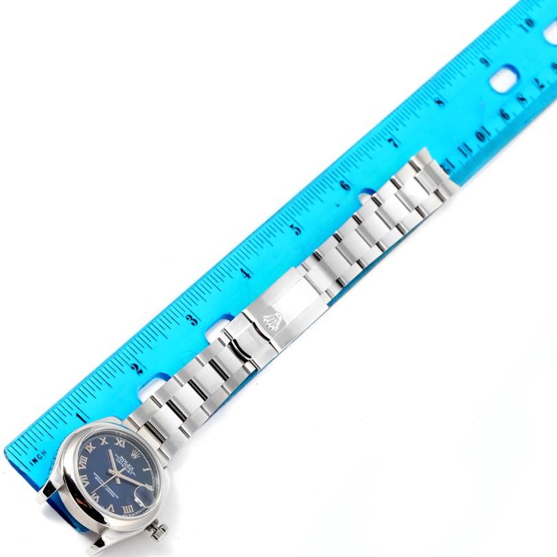 The image shows the full face, bracelet, and clasp of a Rolex Mid-Size 178240 Women's Stainless Steel Blue Dial 178240 Women's Stainless Steel Blue Dial watch, positioned alongside a ruler for size reference.