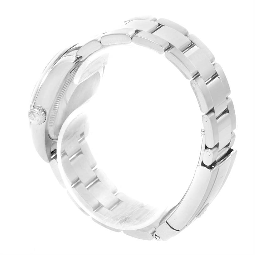 The image shows a side view of a Rolex Mid-Size 178240 Women's Stainless Steel Blue Dial 178240 Women's Stainless Steel Blue Dial watch, highlighting the metal bracelet and crown.