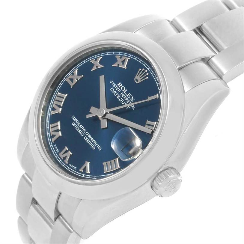 The Rolex Mid-Size 178240 Women's Stainless Steel Blue Dial 178240 Women's Stainless Steel Blue Dial watch is shown from a tilted angle displaying its blue dial, Roman numerals, date window, crown, and stainless steel bracelet.