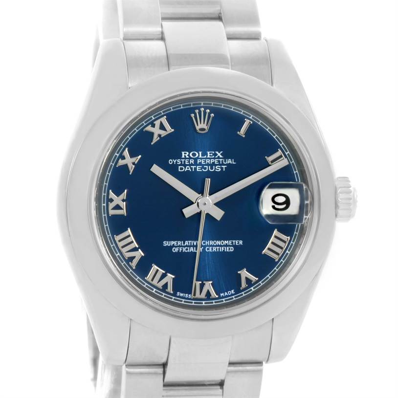 The image shows a front view of a Rolex Datejust Mid-Size watch with a blue dial, Roman numerals, and a date display.