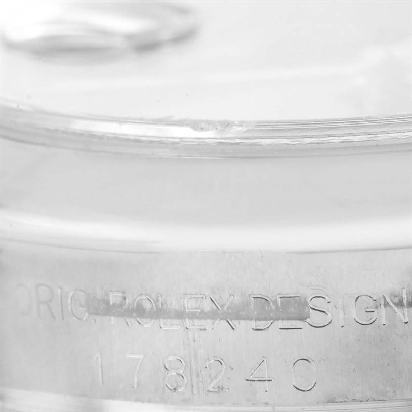 Close-up of the side of a Mid-Size Rolex watch showing the "ORIG ROLEX DESIGN" engraving and model number 178240.
