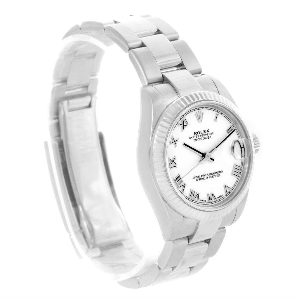 The image shows a side angle of a Rolex Mid-Size 178274 Women's Stainless Steel White Dial 178274 Women's Stainless Steel White Dial Oyster Perpetual Datejust watch with a metallic bracelet and white dial.